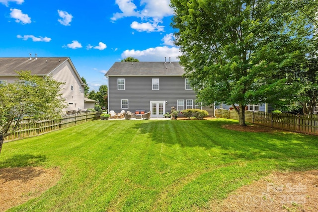 622 Lorain Ave NW, Concord, NC 28027 - back of property with french doors and a fenced backyard