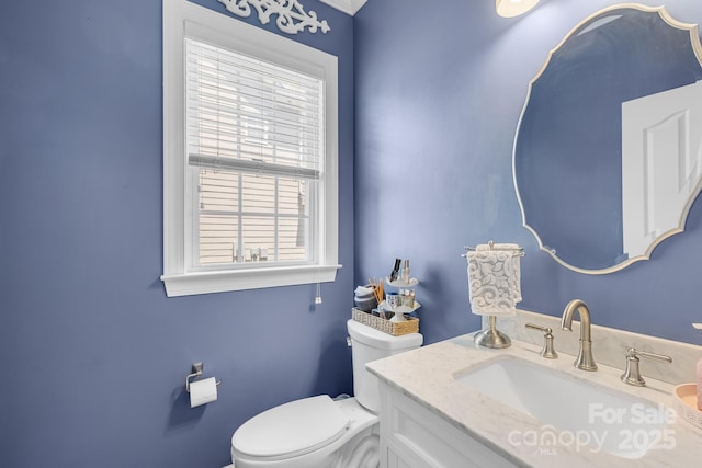622 Lorain Ave NW, Concord, NC 28027 - bathroom featuring toilet and vanity