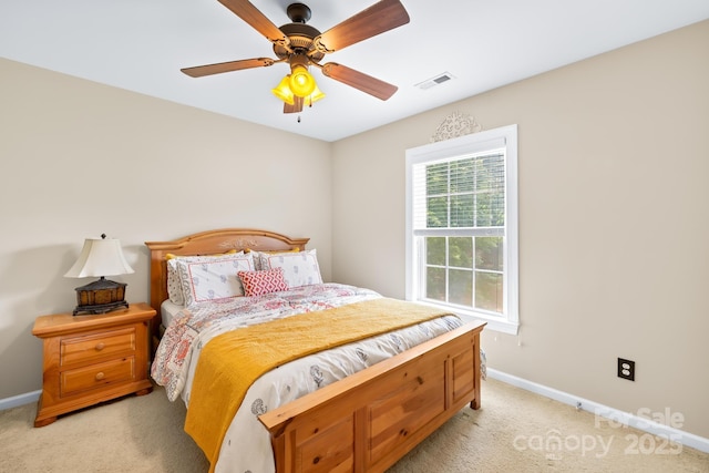 622 Lorain Ave NW, Concord, NC 28027 - bedroom with light colored carpet and ceiling fan