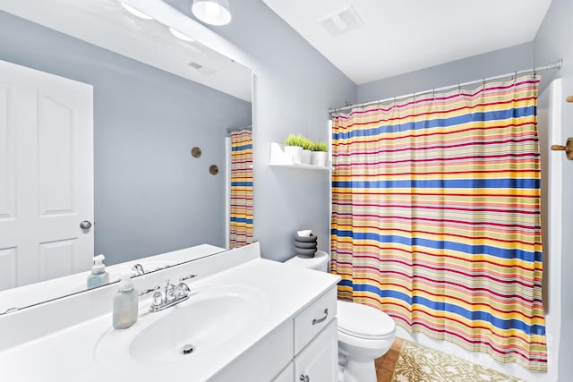 622 Lorain Ave NW, Concord, NC 28027 - full bathroom with vanity, a shower with curtain, and tile patterned floors