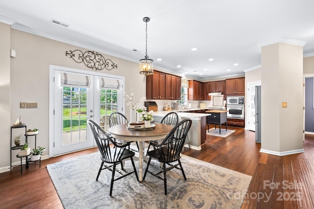 622 Lorain Ave NW, Concord, NC 28027 - dining space with ornamental molding, recessed lighting, and dark wood-style flooring