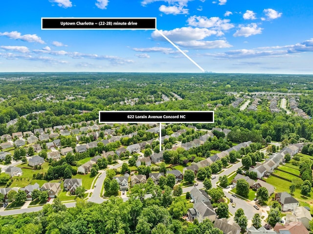 622 Lorain Ave NW, Concord, NC 28027 - aerial view of residential area with a forest