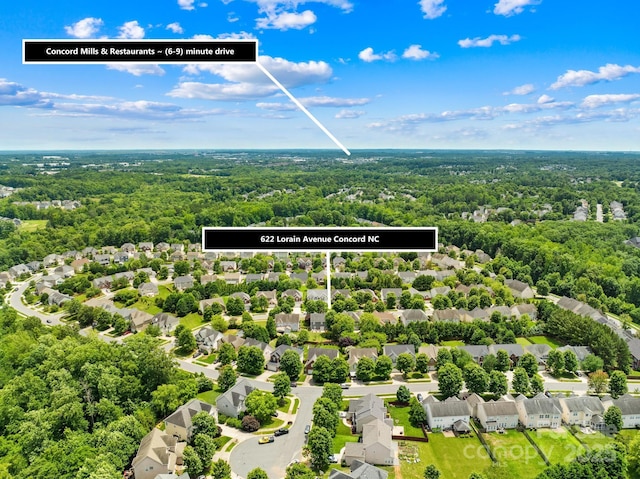 622 Lorain Ave NW, Concord, NC 28027 - aerial view of residential area featuring a heavily wooded area