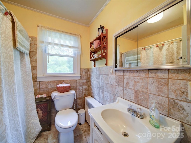 1614 Linwood Rd, Gaston, NC 28052 - full bathroom with crown molding, radiator, toilet, vanity, and tile walls