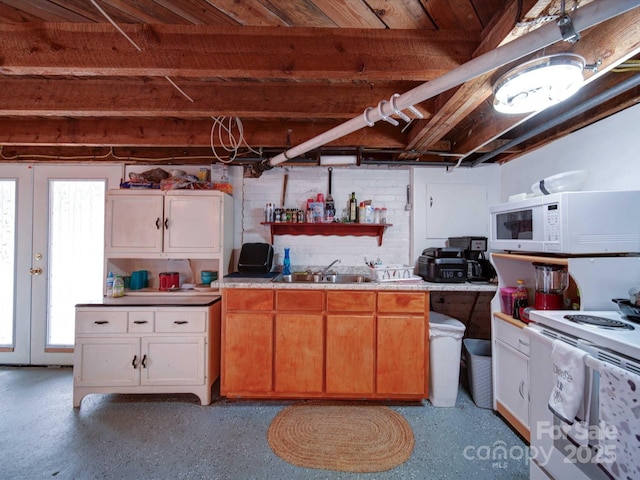 1614 Linwood Rd, Gaston, NC 28052 - kitchen featuring white appliances, open shelves, a sink, and plenty of natural light