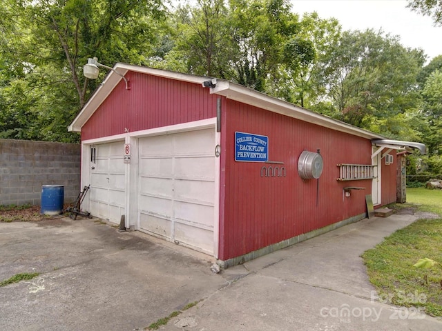 1614 Linwood Rd, Gaston, NC 28052 - detached garage featuring view of wooded area
