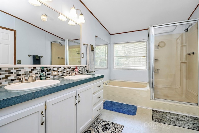 4104 Pebblebrook Cir SW, Concord, NC 28027 - bathroom featuring a shower stall, double vanity, backsplash, a garden tub, and ornamental molding