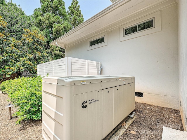 4300 Cameron Oaks Dr, Charlotte, NC 28211 - exterior view of a power unit and stucco siding