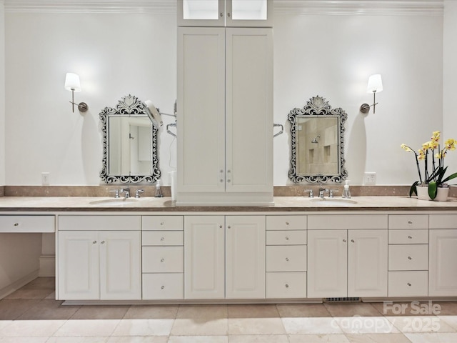 4300 Cameron Oaks Dr, Charlotte, NC 28211 - bathroom featuring crown molding, double vanity, and tile patterned floors