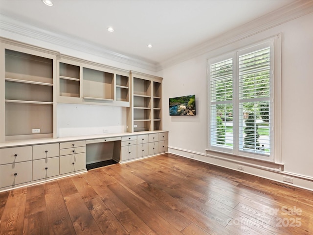 4300 Cameron Oaks Dr, Charlotte, NC 28211 - unfurnished office with built in desk, hardwood / wood-style floors, ornamental molding, and recessed lighting