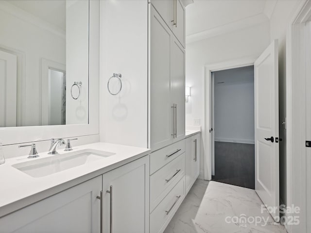 4300 Cameron Oaks Dr, Charlotte, NC 28211 - bathroom featuring double vanity, marble finish floors, and ornamental molding