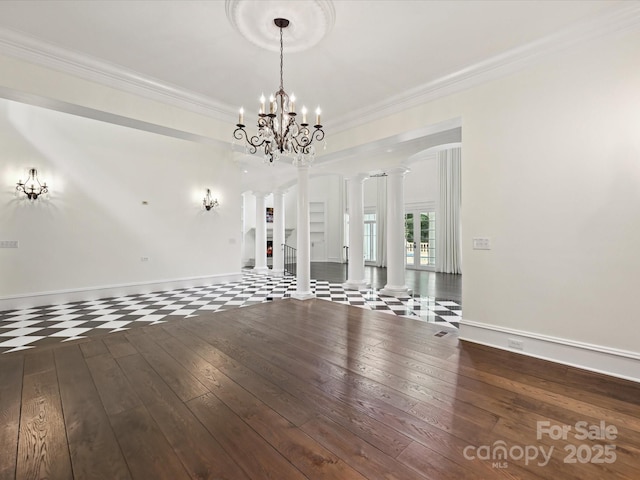 4300 Cameron Oaks Dr, Charlotte, NC 28211 - unfurnished room featuring decorative columns, wood-type flooring, crown molding, and a chandelier