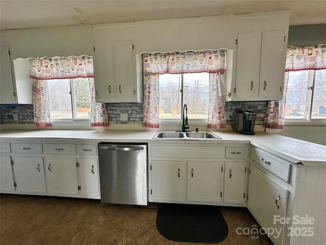 178 Cedar Valley Rd, Hudson, NC 28638 - kitchen with dishwasher, a sink, healthy amount of natural light, and light countertops