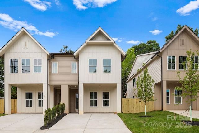 2413 Pruitt St, Charlotte, NC 28208 - view of front of property featuring board and batten siding and a patio