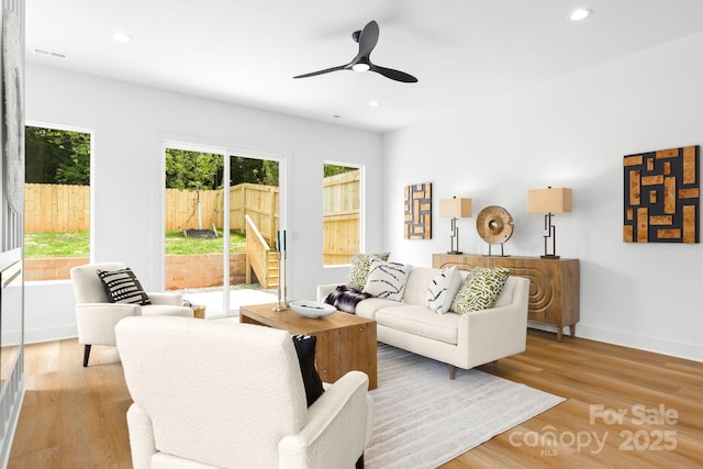 2413 Pruitt St, Charlotte, NC 28208 - living area with light wood-style flooring, recessed lighting, and ceiling fan