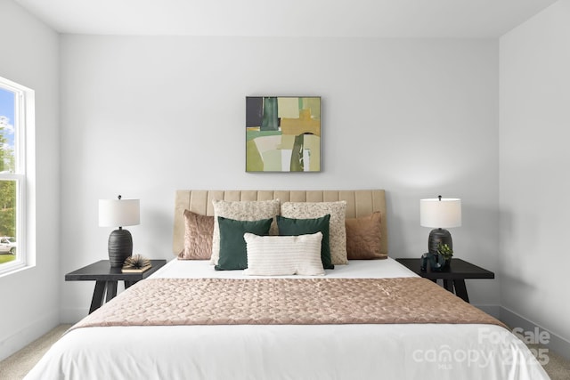 2413 Pruitt St, Charlotte, NC 28208 - carpeted bedroom featuring baseboards