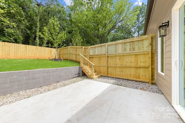 2413 Pruitt St, Charlotte, NC 28208 - fenced backyard featuring a patio area