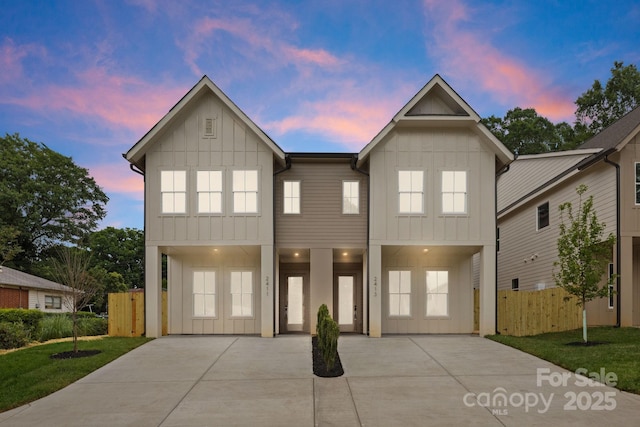 2413 Pruitt St, Charlotte, NC 28208 - view of front facade featuring board and batten siding and concrete driveway