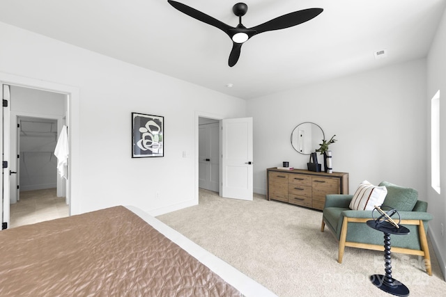 2413 Pruitt St, Charlotte, NC 28208 - carpeted bedroom featuring baseboards and ceiling fan