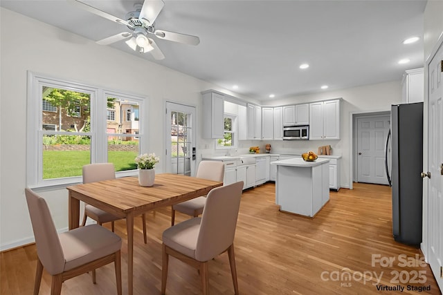 765 Portpatrick Pl, Fort Mill, SC 29708 - dining space with light wood-type flooring, recessed lighting, a ceiling fan, and baseboards