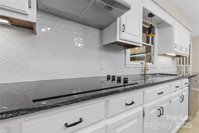 5916 Cashion Rd, Huntersville, NC 28078 - kitchen with custom exhaust hood, a sink, tasteful backsplash, and black electric cooktop