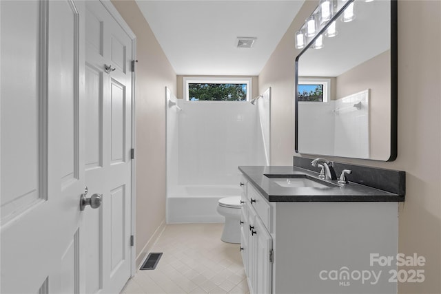 5916 Cashion Rd, Huntersville, NC 28078 - bathroom with vanity, toilet, baseboards, bathing tub / shower combination, and tile patterned floors