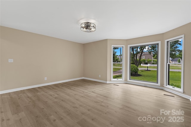 5916 Cashion Rd, Huntersville, NC 28078 - empty room with wood finished floors and baseboards