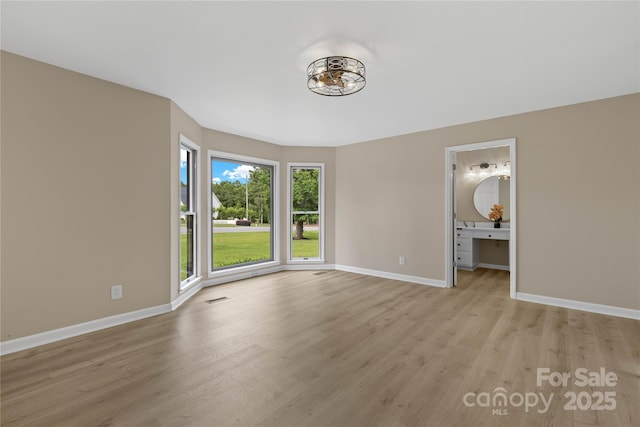 5916 Cashion Rd, Huntersville, NC 28078 - empty room with light wood-style floors and baseboards