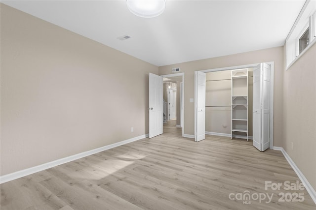 5916 Cashion Rd, Huntersville, NC 28078 - unfurnished bedroom featuring light wood-style floors, baseboards, and a closet