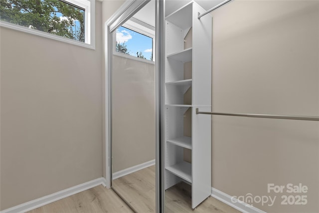 5916 Cashion Rd, Huntersville, NC 28078 - spacious closet featuring wood finished floors