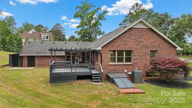5916 Cashion Rd, Huntersville, NC 28078 - back of house with a pergola, central AC, brick siding, and a wooden deck