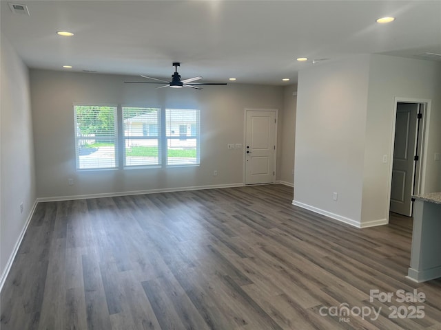 1312 W Monroe Rd, Salisbury, NC 28144 - unfurnished living room featuring baseboards, ceiling fan, recessed lighting, and dark wood-style flooring