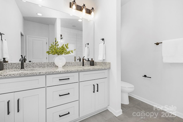 1312 W Monroe Rd, Salisbury, NC 28144 - full bathroom featuring double vanity, tile patterned floors, and a shower stall