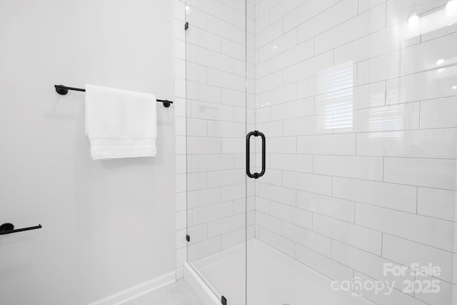 1312 W Monroe Rd, Salisbury, NC 28144 - bathroom featuring a stall shower and baseboards