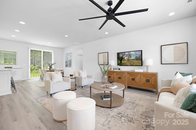 1312 W Monroe Rd, Salisbury, NC 28144 - living area with light wood finished floors, recessed lighting, and ceiling fan