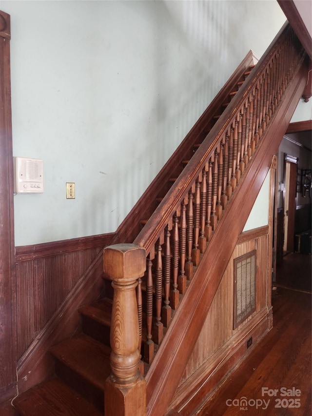 425 W Horah St, Salisbury, NC 28144 - stairs with wainscoting, wood finished floors, and wooden walls