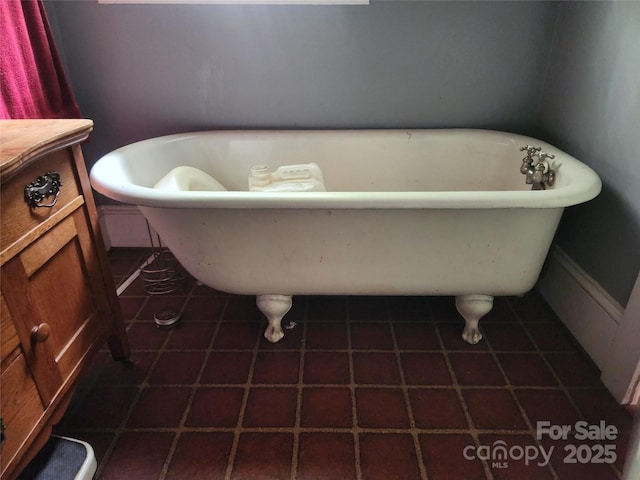 425 W Horah St, Salisbury, NC 28144 - full bath with vanity, a freestanding bath, and tile patterned floors