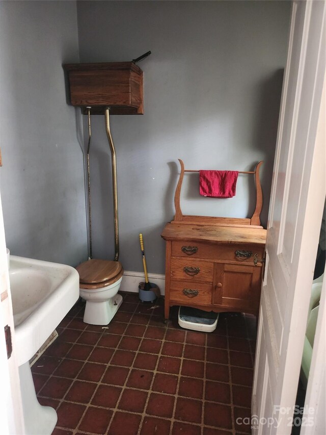 425 W Horah St, Salisbury, NC 28144 - bathroom with tile patterned floors and toilet