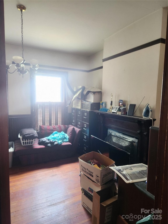 425 W Horah St, Salisbury, NC 28144 - bedroom with a chandelier, hardwood / wood-style flooring, and a wainscoted wall