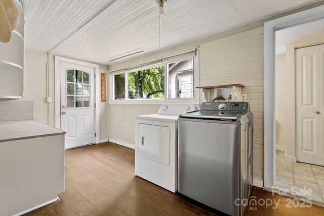 113 4th St, Black Mountain, NC 28711 - laundry room with washer and clothes dryer and dark wood-type flooring