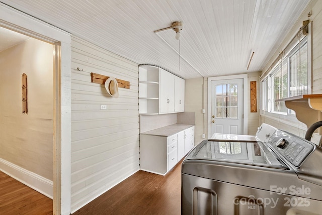 113 4th St, Black Mountain, NC 28711 - laundry area with independent washer and dryer, cabinet space, dark wood-style flooring, wood ceiling, and wooden walls