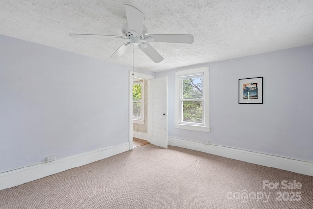 113 4th St, Black Mountain, NC 28711 - unfurnished room featuring carpet flooring, a textured ceiling, ceiling fan, and baseboards