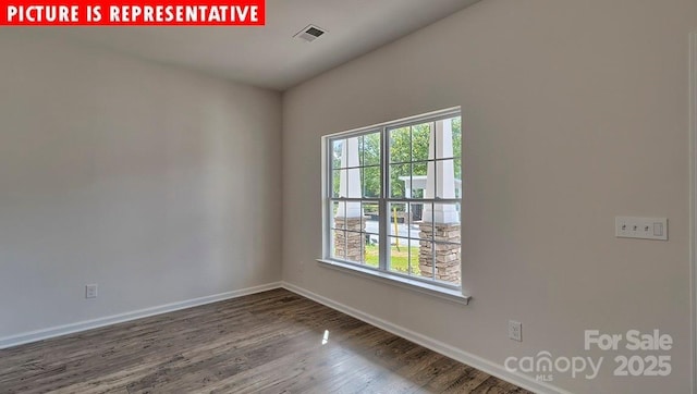 1369 Secrest Commons Dr, Monroe, NC 28112 - unfurnished room featuring baseboards and wood finished floors