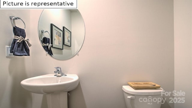 1369 Secrest Commons Dr, Monroe, NC 28112 - half bathroom featuring toilet