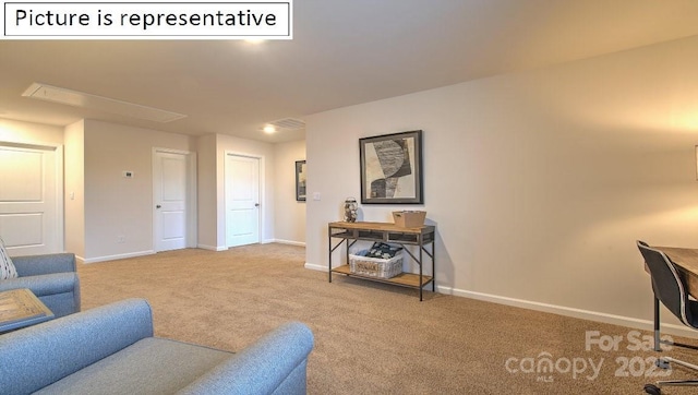 1369 Secrest Commons Dr, Monroe, NC 28112 - living room featuring carpet, baseboards, and attic access