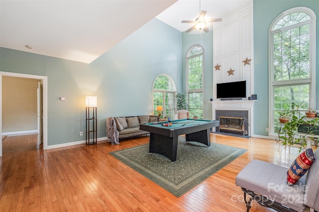 8219 Beardsley Dr, Charlotte, NC 28269 - playroom featuring pool table, healthy amount of natural light, light wood-style floors, high vaulted ceiling, and baseboards
