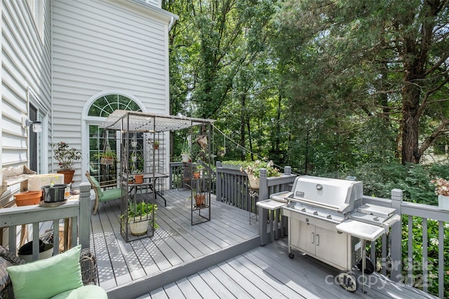 8219 Beardsley Dr, Charlotte, NC 28269 - wooden deck featuring a grill