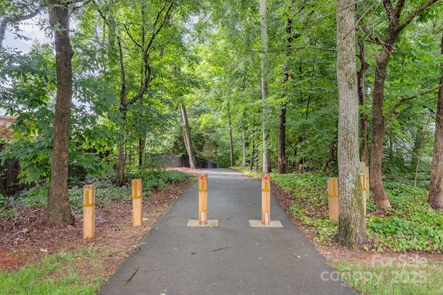8219 Beardsley Dr, Charlotte, NC 28269 - view of home's community featuring a forest view
