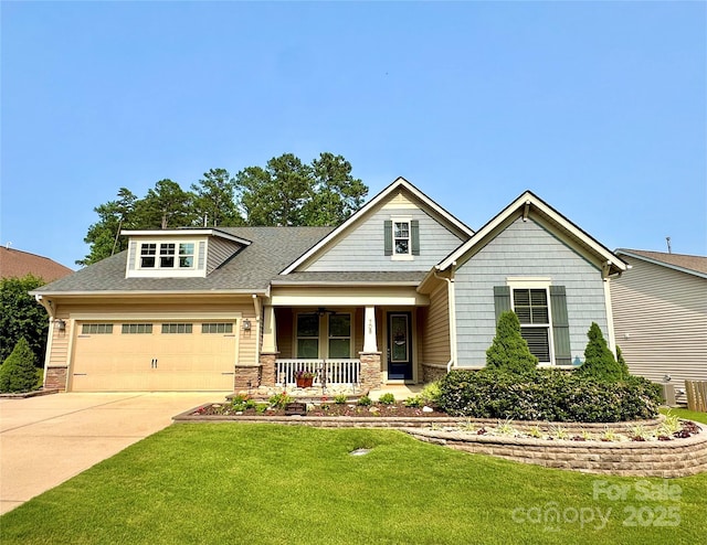 708 Ardent Trl, Belmont, NC 28012 - craftsman-style home featuring a porch, an attached garage, a front lawn, driveway, and a shingled roof