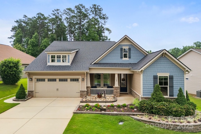 708 Ardent Trl, Belmont, NC 28012 - craftsman house featuring a porch, stone siding, concrete driveway, and roof with shingles
